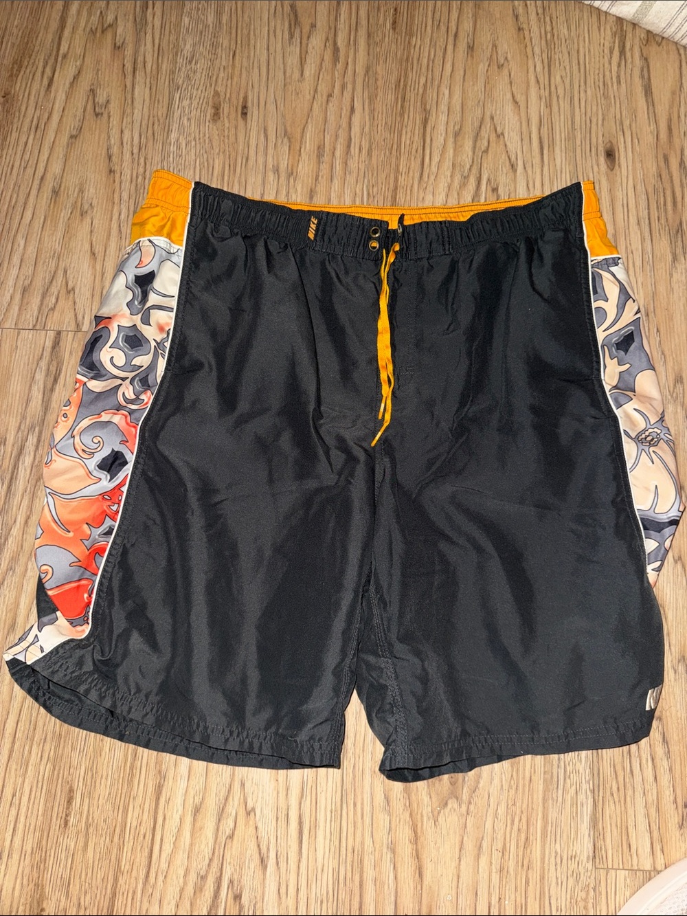Nike Men's Black Swim Trunks with Orange Accents Y2K Tribal
